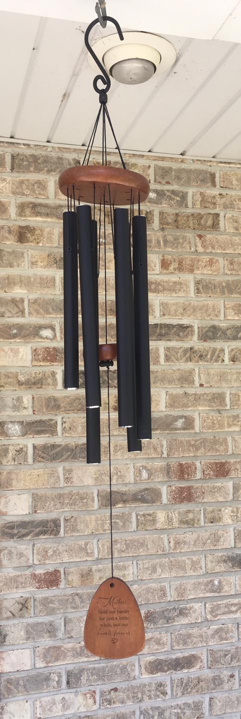 Wind chime with engraved wood pendant